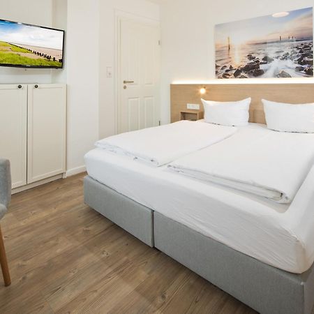 Haus Menno Janssen - Doppelzimmer Norderney Esterno foto
