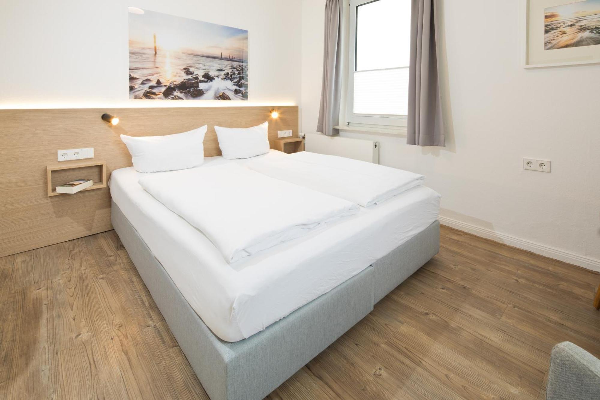 Haus Menno Janssen - Doppelzimmer Norderney Esterno foto
